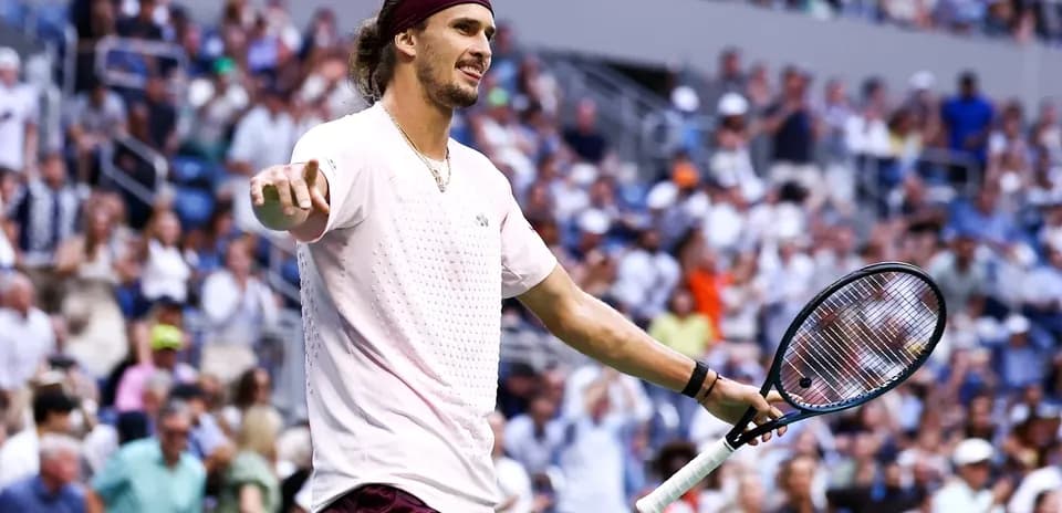 Tennis player celebrating during a match at stadium