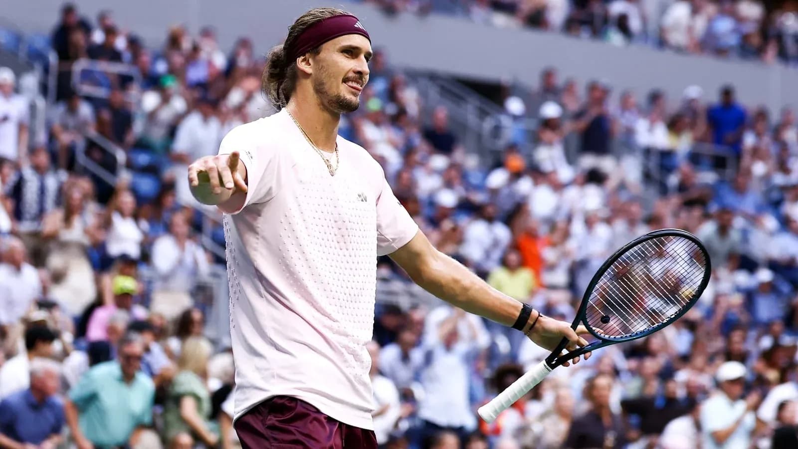 Tennis player celebrating during a match at stadium