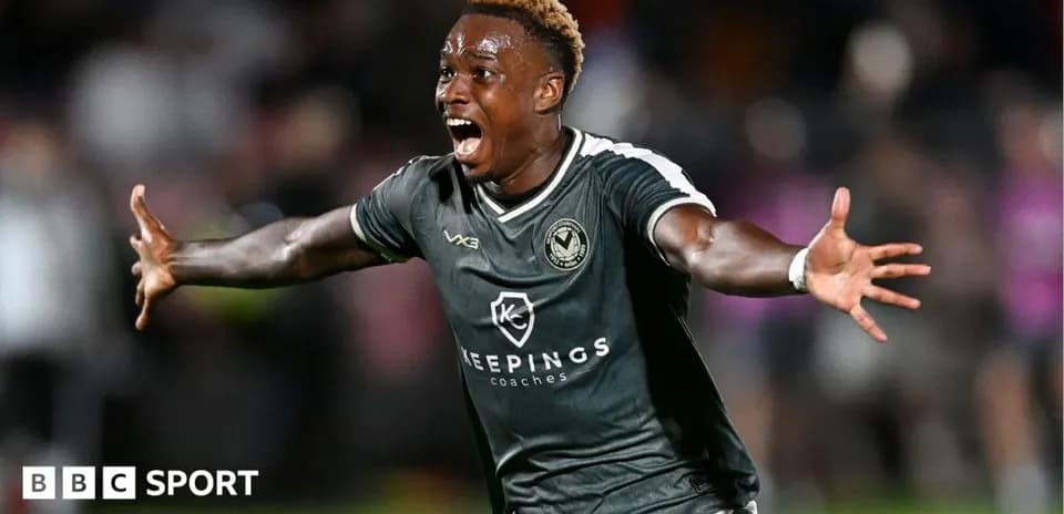 Player celebrating after scoring a goal during match