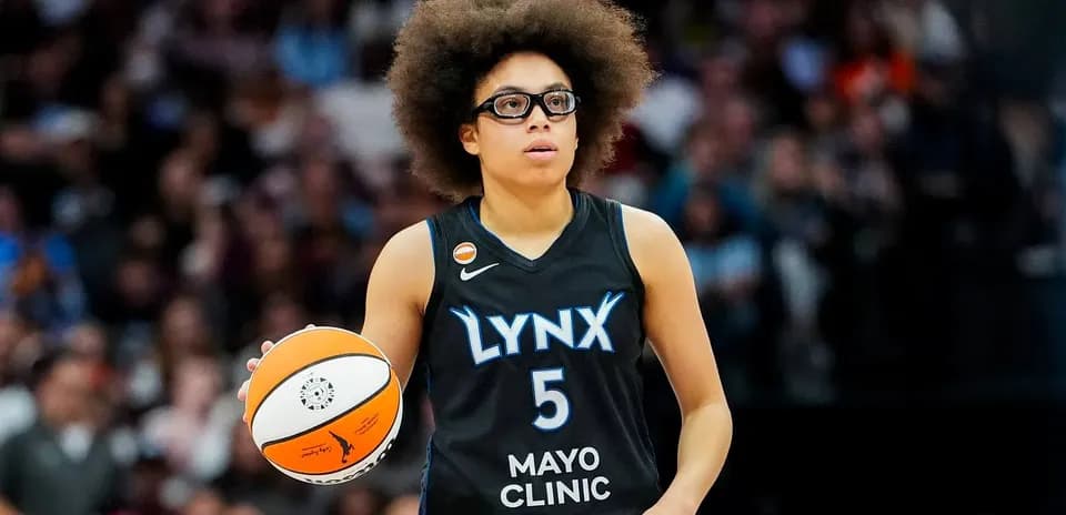 Player dribbling basketball during a game