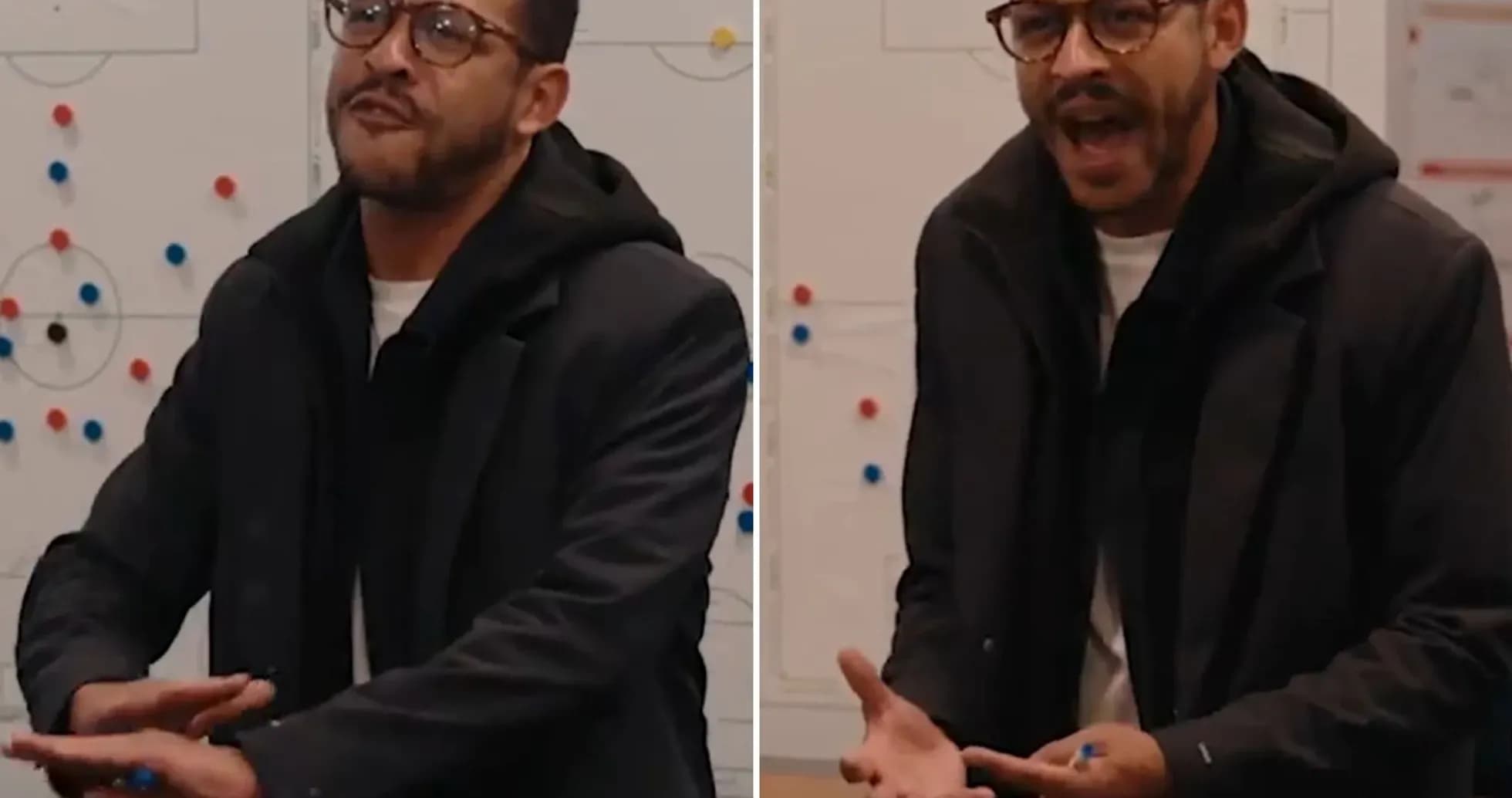 Coach explaining strategy in front of a whiteboard