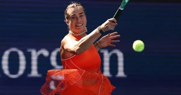 Player hitting a tennis ball during a match