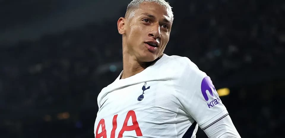 Player celebrating goal in Tottenham jersey