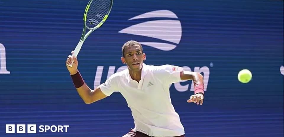 Tennis player preparing to hit a forehand shot