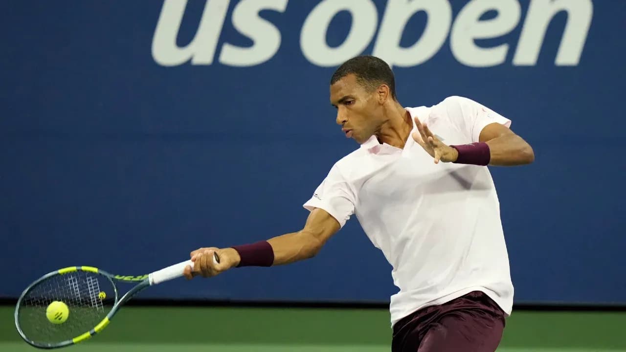 Player hitting a forehand during US Open match