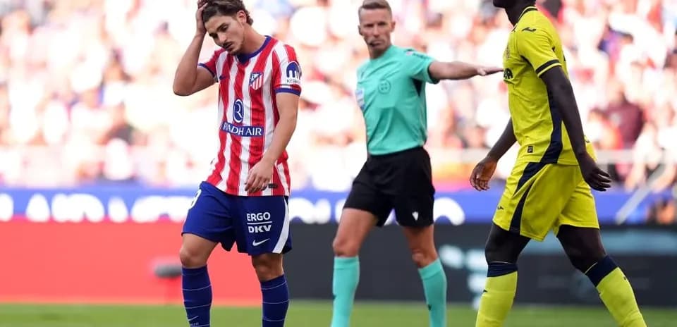 Atletico Madrid player shows frustration during match
