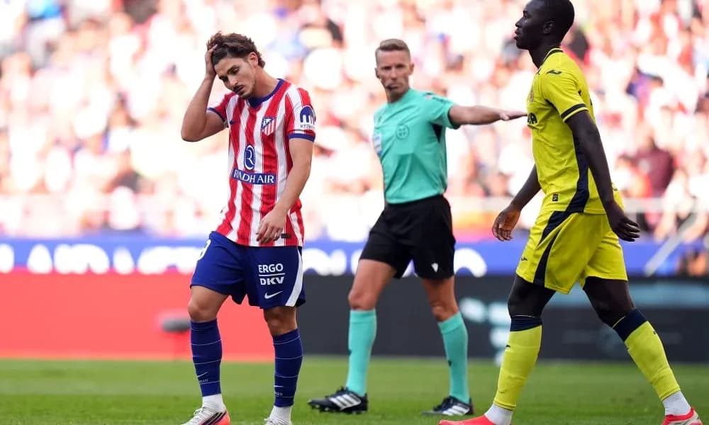 Atletico Madrid player shows frustration during match