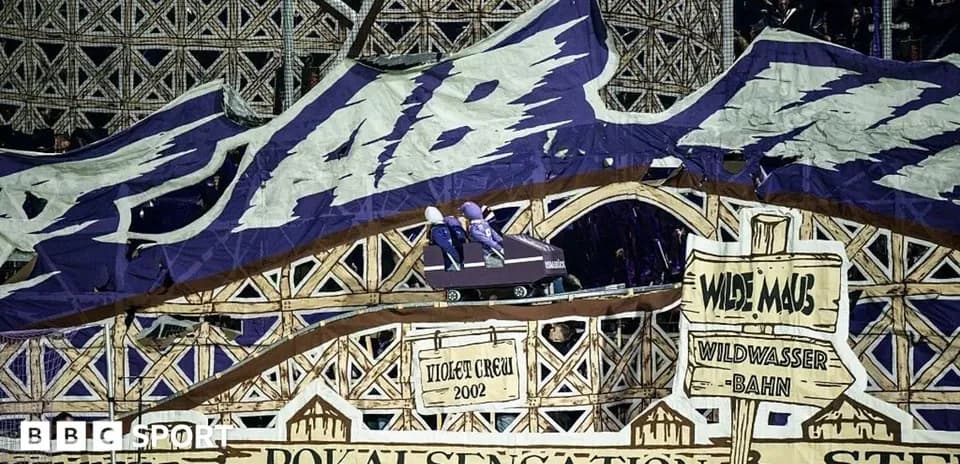 Large fan banner displayed during a match