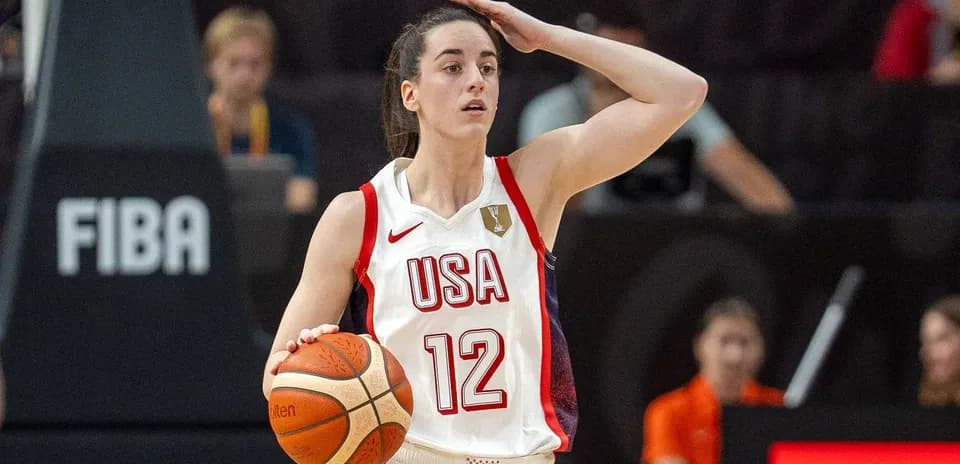 Player with ball signaling during basketball game