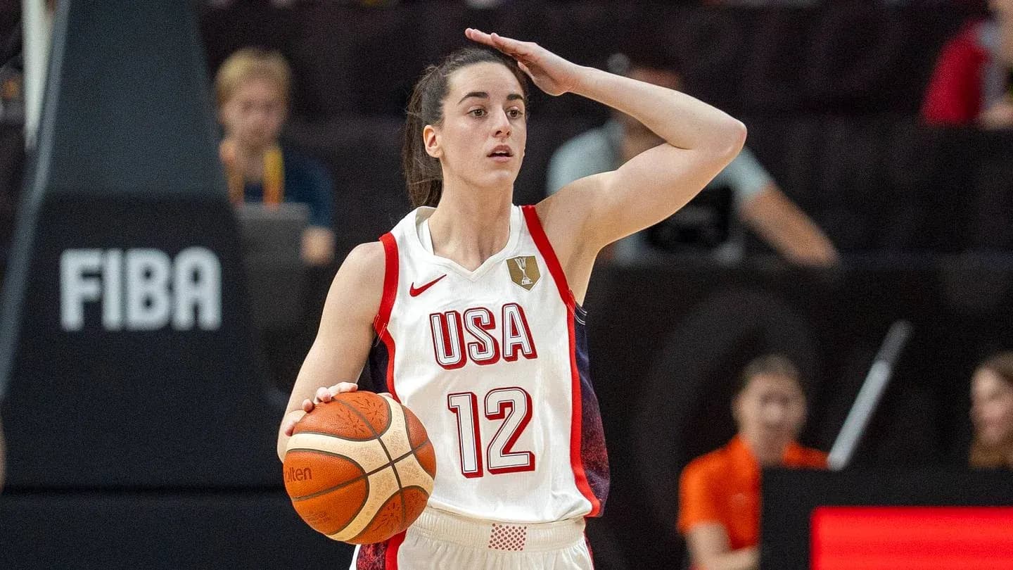 Player with ball signaling during basketball game
