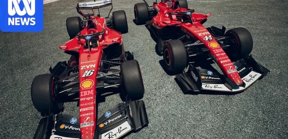 Two Ferrari F1 cars on racetrack