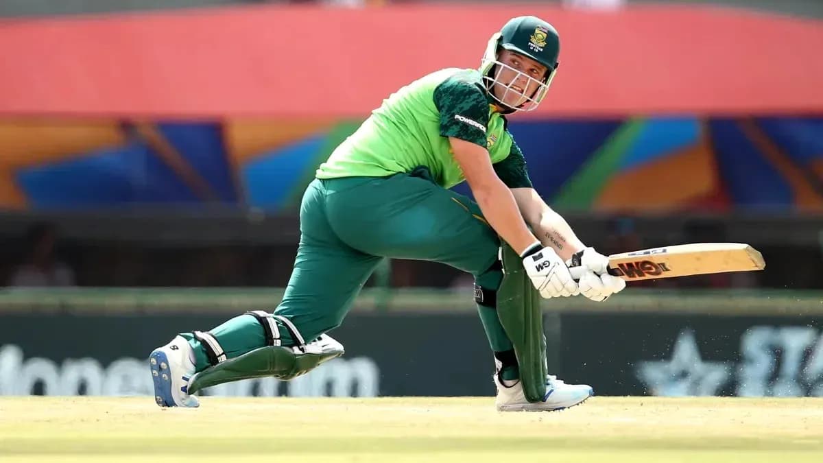 Batter playing a shot during cricket match