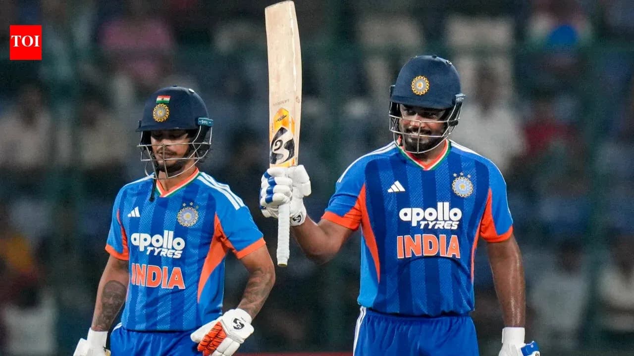 Two Indian cricketers celebrating during a match