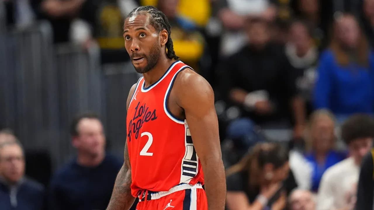 Kawhi Leonard in red Los Angeles jersey on court