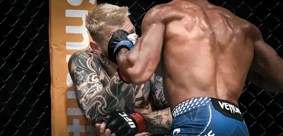 Two fighters engaged in a close combat exchange