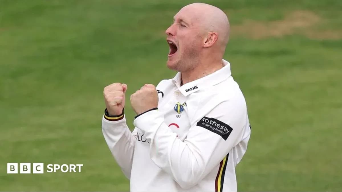 Cricketer celebrating after taking a wicket