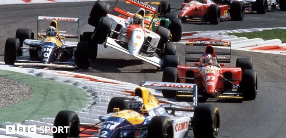 Formula 1 cars racing on track during competition