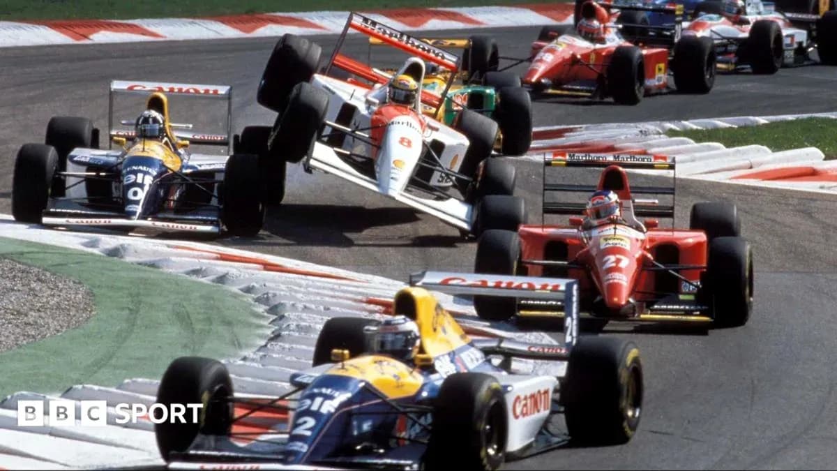 Formula 1 cars racing on track during competition