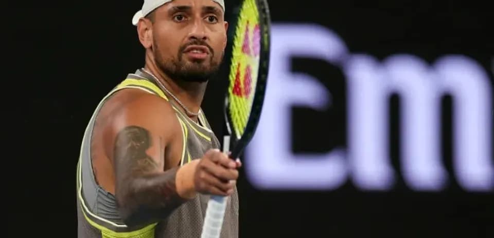Tennis player holding racket during match