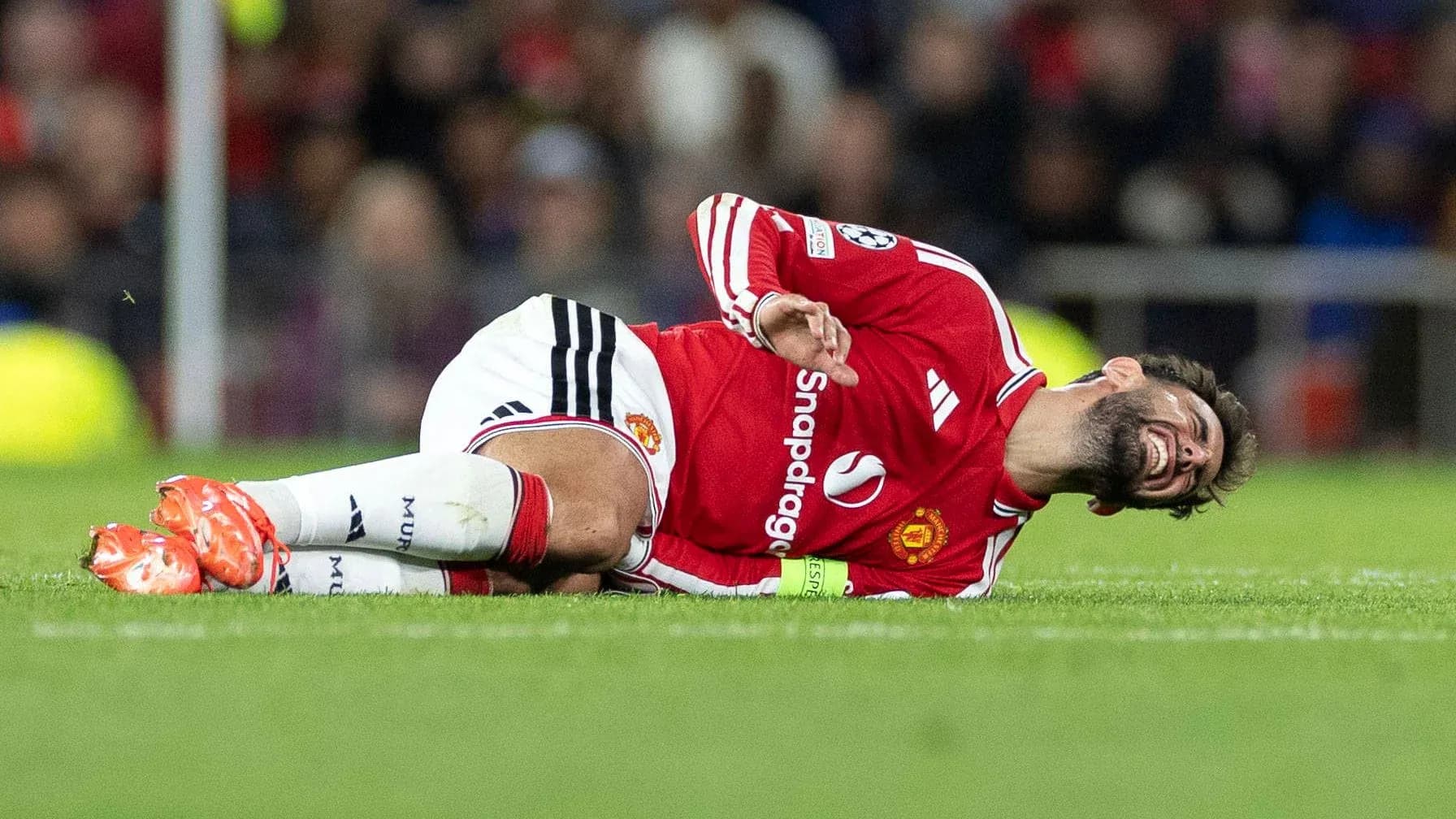 Player on the ground after injury during match
