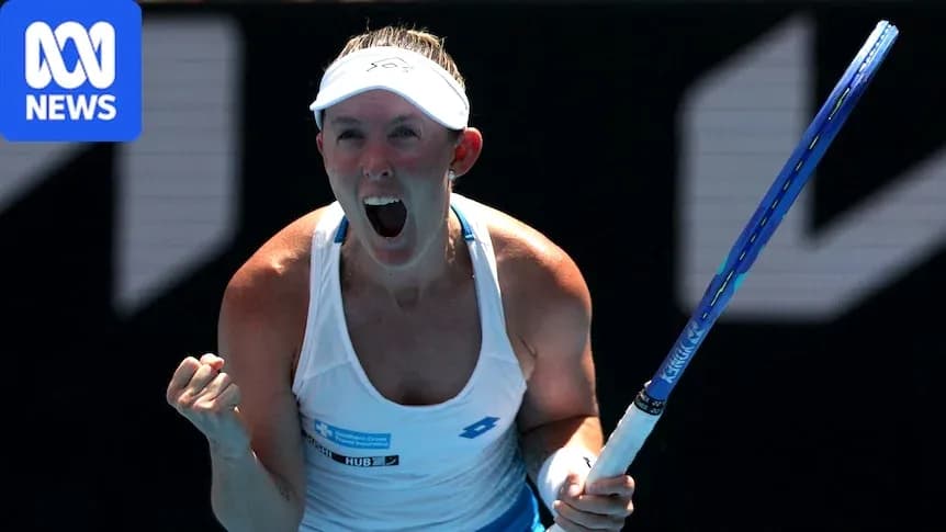 Tennis player celebrating victory with raised fist