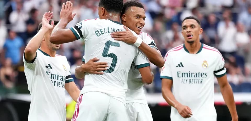 Players celebrating a goal during a match
