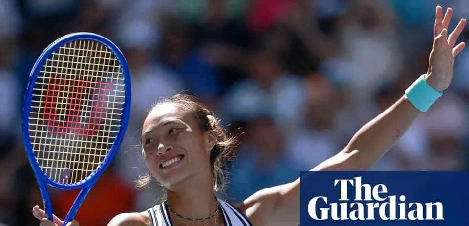Tennis player celebrating with racket after winning match