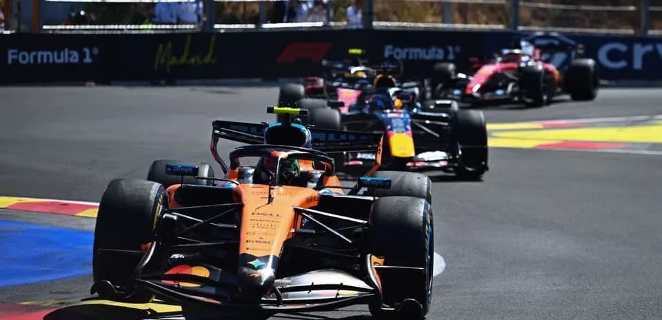 Formula 1 cars racing on track in Madrid