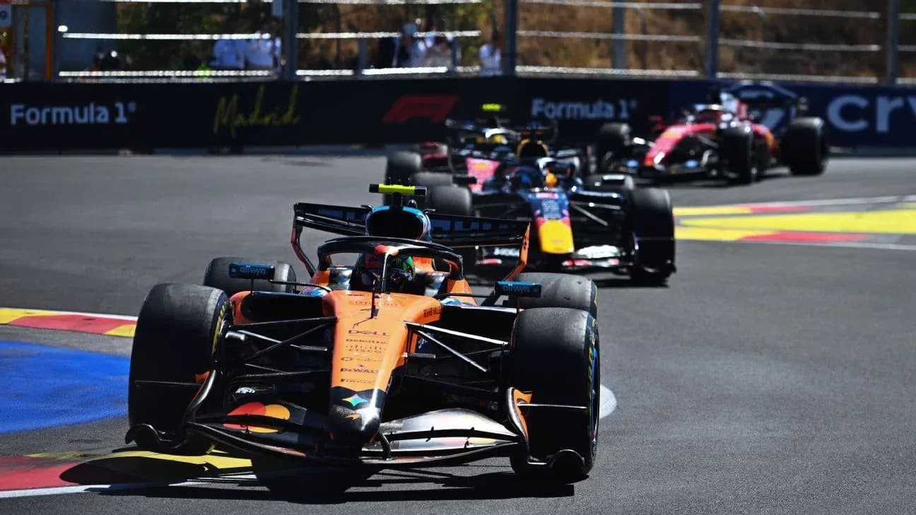 Formula 1 cars racing on track in Madrid