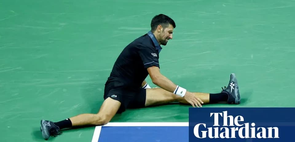Tennis player stretching on court during match