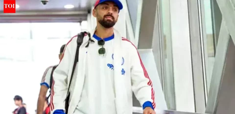 Player arriving at airport with luggage and sunglasses