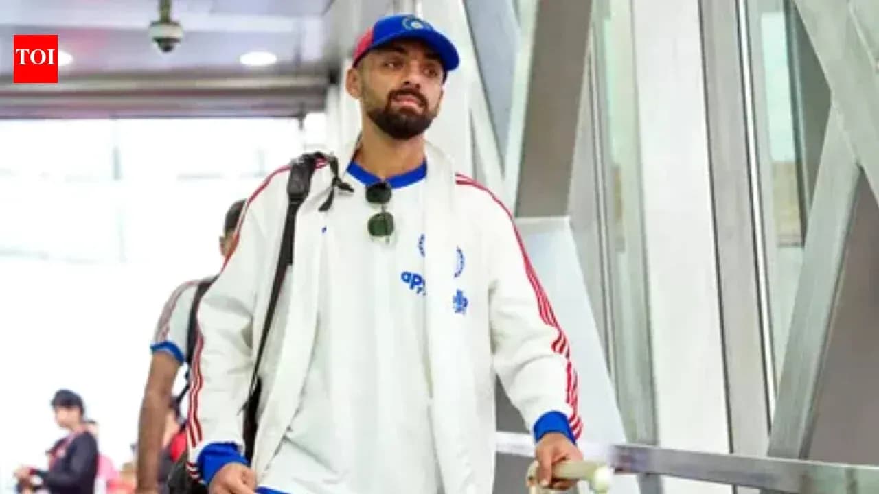 Player arriving at airport with luggage and sunglasses