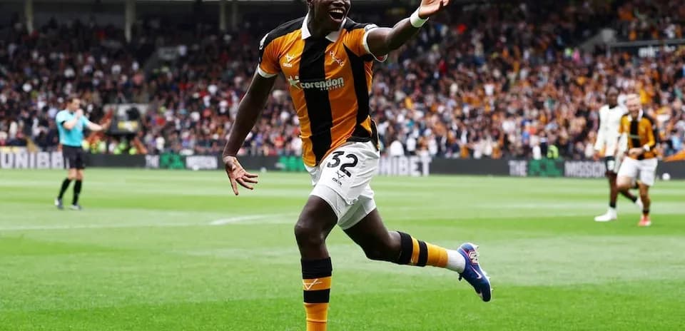 Hull City player celebrating a goal during match