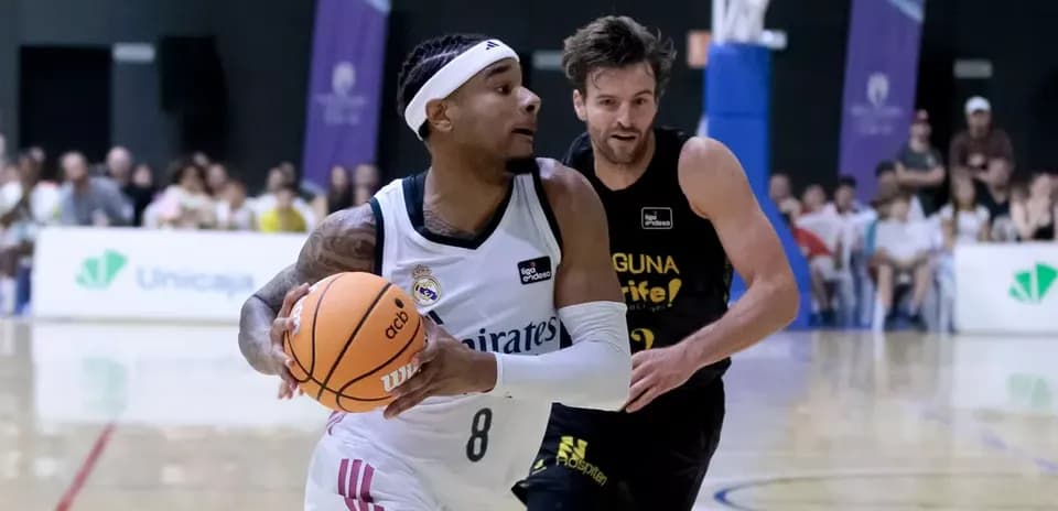 Player dribbling basketball during competitive match