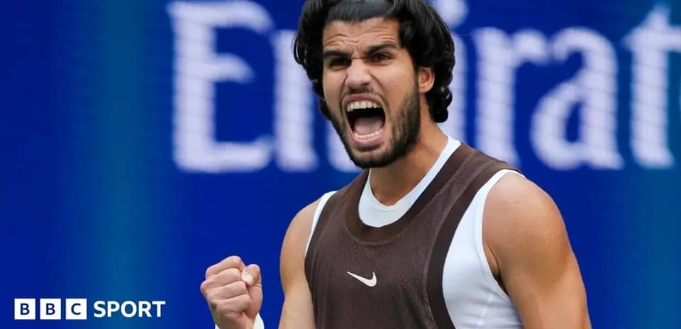 Tennis player celebrating a point during match