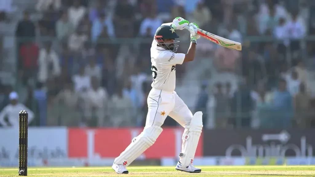 Batsman playing a shot during cricket match