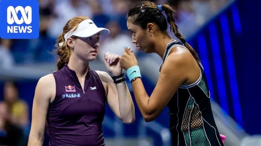 Two female tennis players discussing strategy during match
