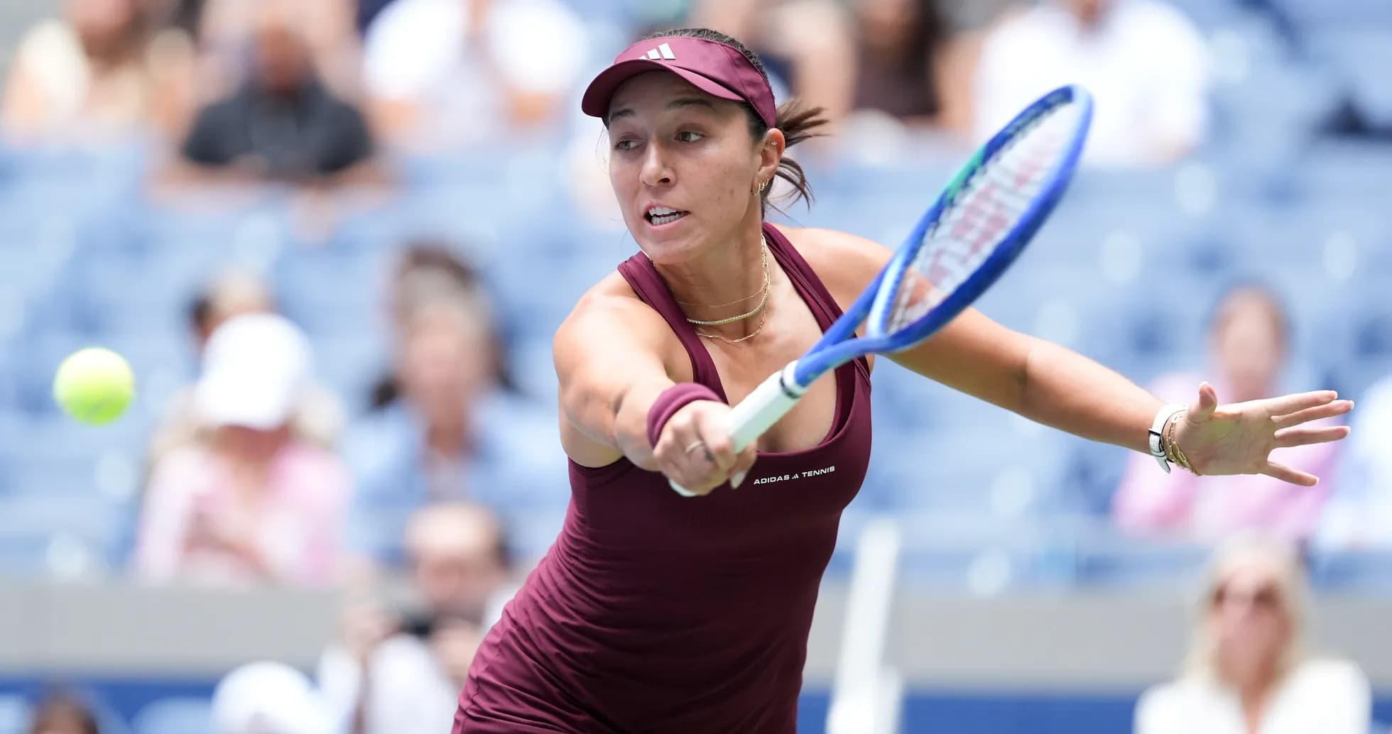 Female tennis player hitting a forehand shot