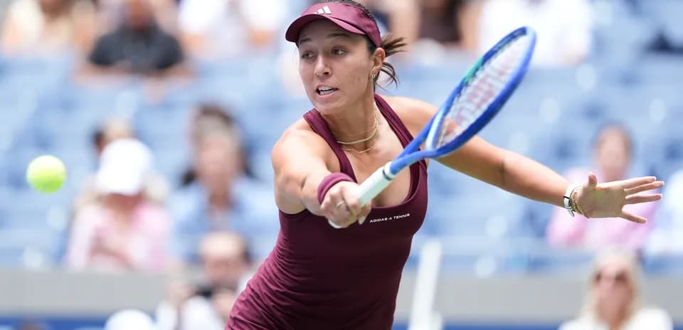 Female tennis player hitting a forehand shot