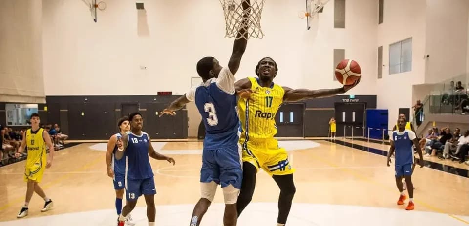Player dunking the basketball during a game