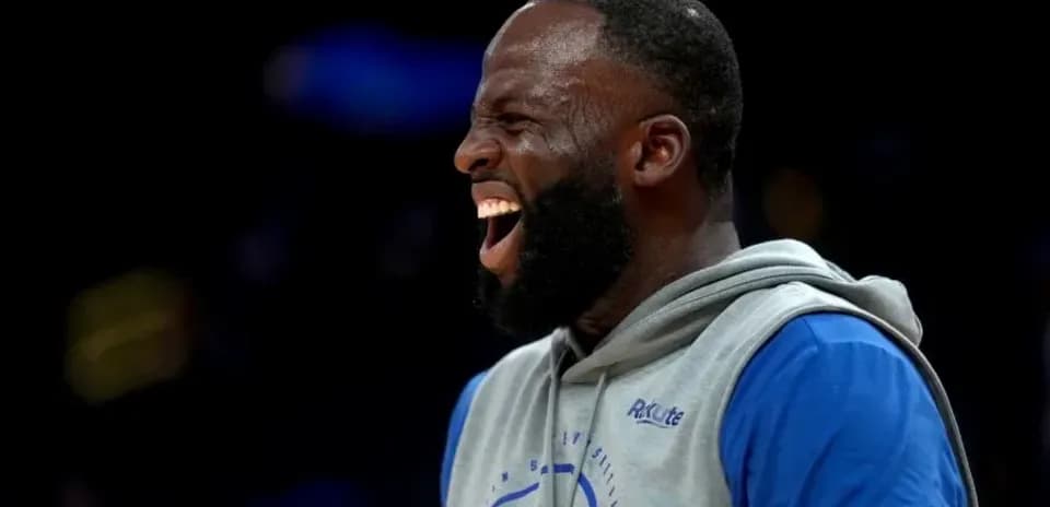 Player laughing during warm-up session on court