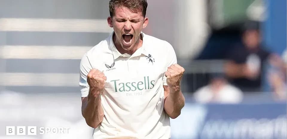 Cricketer celebrating after taking a wicket