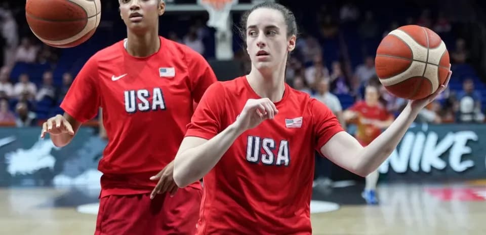 Two players warming up in USA basketball uniforms