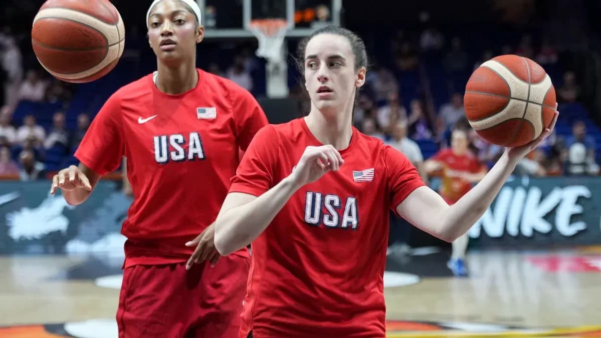 Two players warming up in USA basketball uniforms