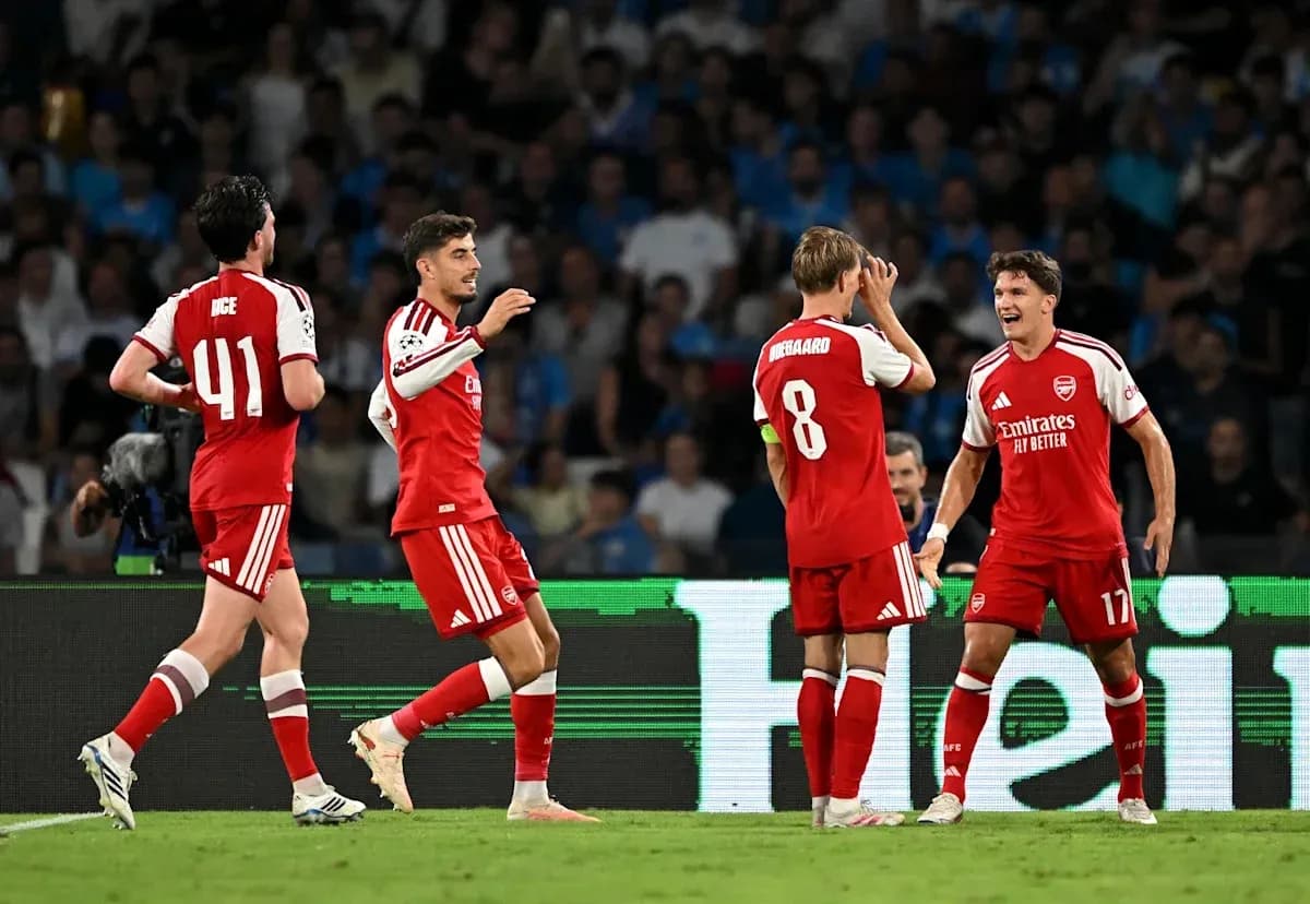 Arsenal players celebrating a goal during match
