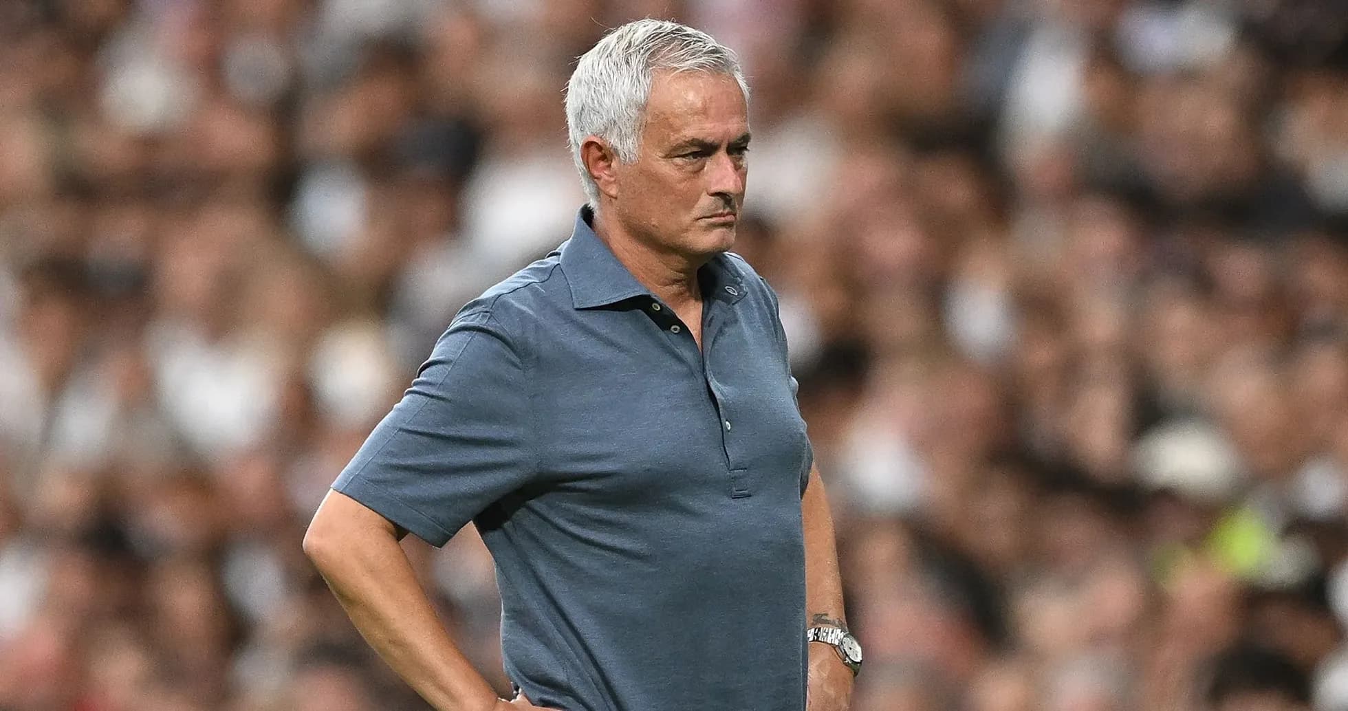 Manager observing the match from the sidelines