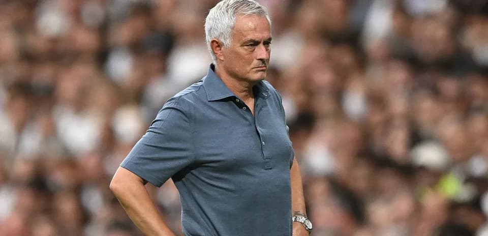Manager observing the match from the sidelines