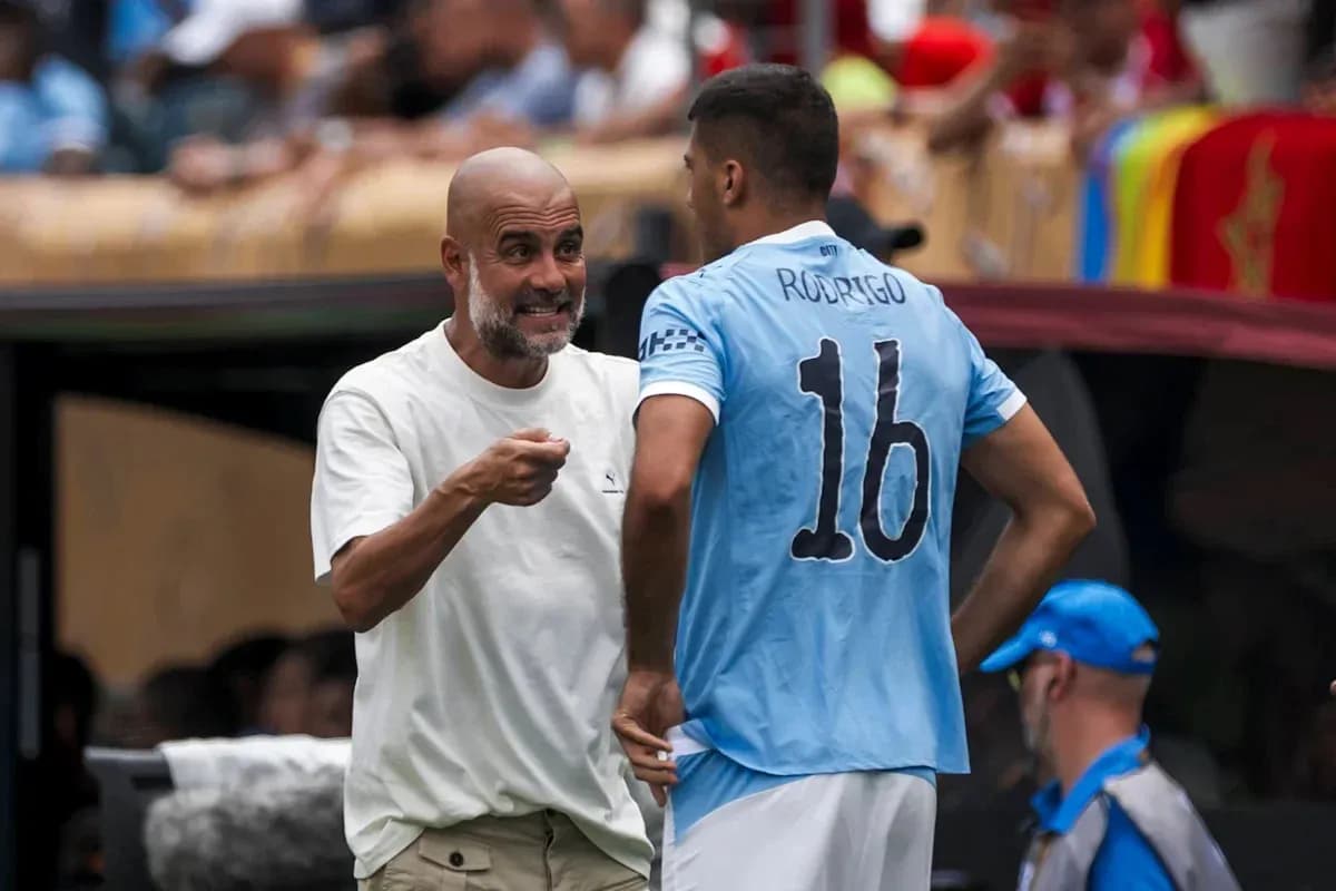 Manager discussing strategy with player on sidelines