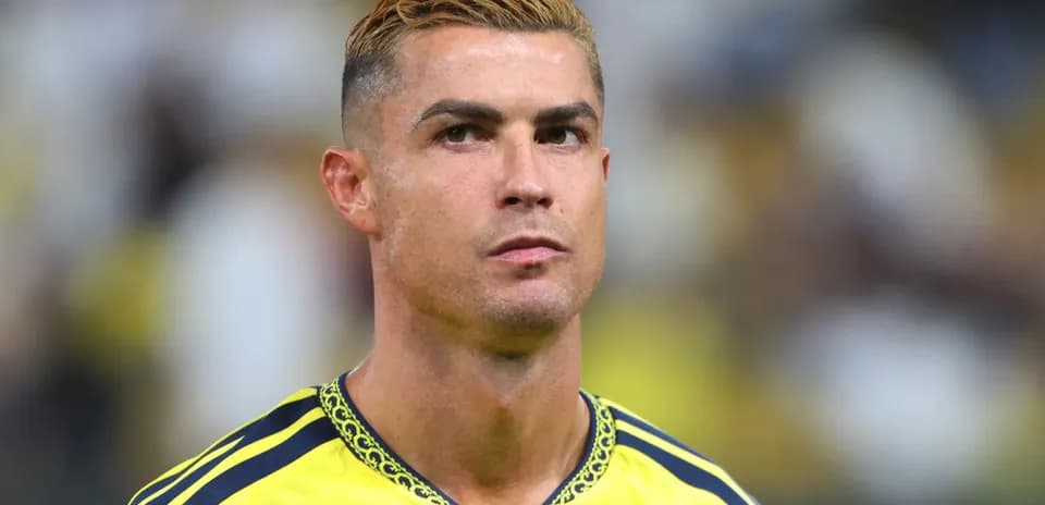 Player in yellow jersey during match preparation