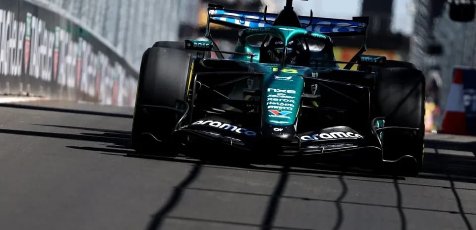 Aston Martin F1 car racing on track
